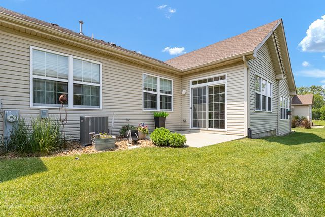 17228 Fontana Ln, Lockport, IL 60441 - back of property featuring a lawn and a patio area