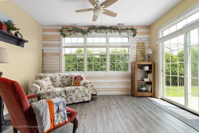 17228 Fontana Ln, Lockport, IL 60441 - sunroom featuring wooden walls and wood finished floors