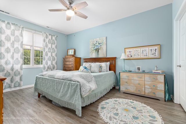 17228 Fontana Ln, Lockport, IL 60441 - bedroom with wood finished floors and ceiling fan