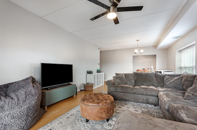 390 W Mahogany Ct Unit 301, Palatine, IL 60067 - living room featuring wood finished floors, a chandelier, ceiling fan, and lofted ceiling