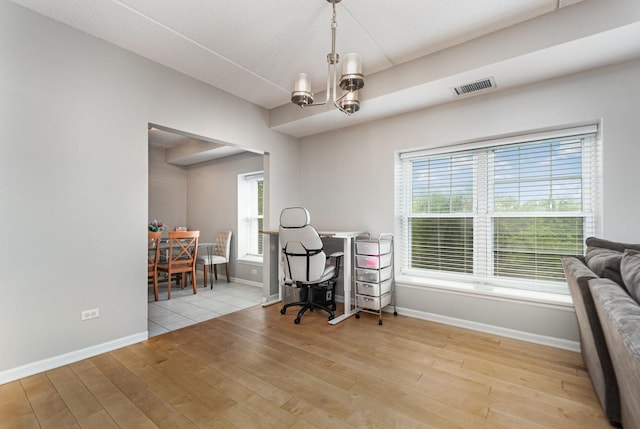 390 W Mahogany Ct Unit 301, Palatine, IL 60067 - office featuring wood finished floors, a chandelier, and baseboards