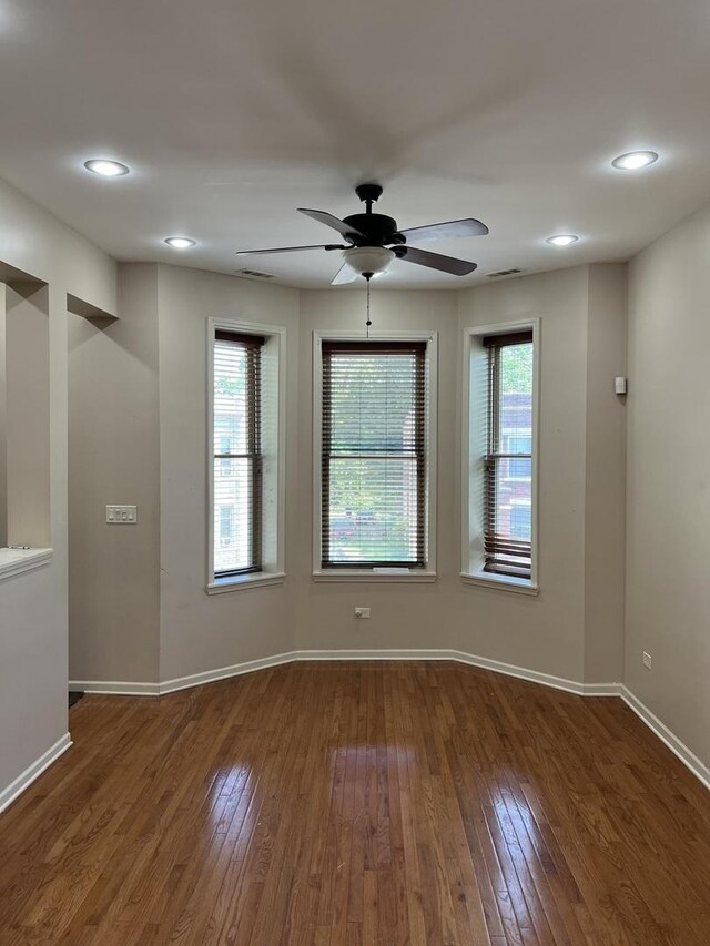 5722 S Aberdeen St, Chicago, IL 60621 - spare room with hardwood / wood-style flooring, a ceiling fan, healthy amount of natural light, and recessed lighting