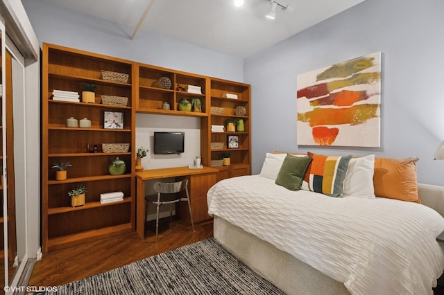 520 W Huron St Unit 220, Chicago, IL 60654 - bedroom with dark wood-style floors, an office area, and rail lighting