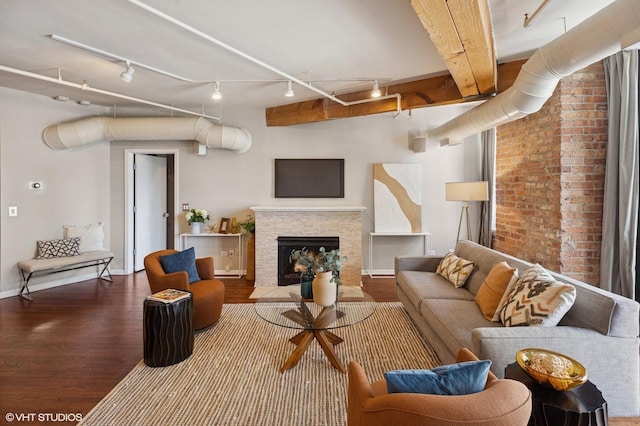520 W Huron St Unit 220, Chicago, IL 60654 - living area featuring wood finished floors, a fireplace, and track lighting