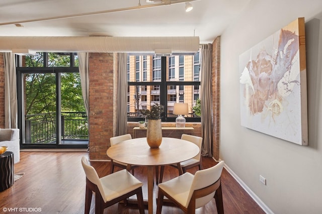 520 W Huron St Unit 220, Chicago, IL 60654 - dining area featuring wood finished floors and baseboards