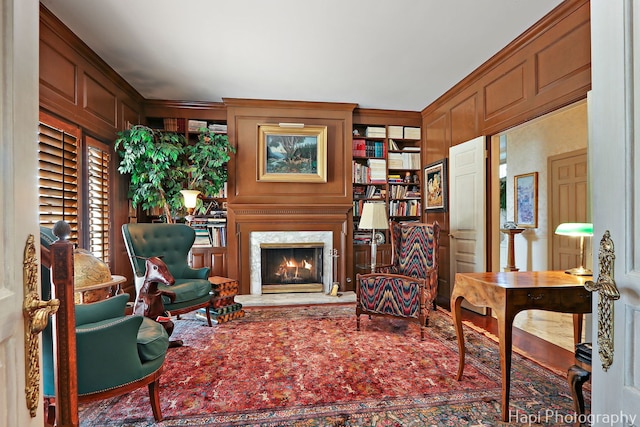 7 3 Lakes Rd, Barrington Hills, IL 60010 - sitting room with a fireplace, built in features, and a decorative wall