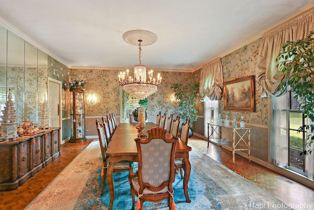 7 3 Lakes Rd, Barrington Hills, IL 60010 - dining area with wallpapered walls, a chandelier, crown molding, and wainscoting