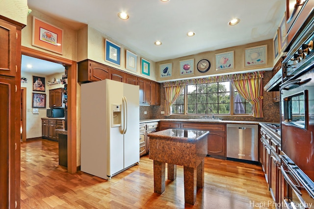 7 3 Lakes Rd, Barrington Hills, IL 60010 - kitchen featuring white fridge with ice dispenser, dishwasher, oven, recessed lighting, and light wood-type flooring