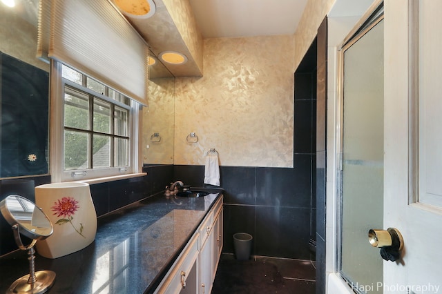 7 3 Lakes Rd, Barrington Hills, IL 60010 - full bathroom featuring vanity, tile walls, and a wainscoted wall
