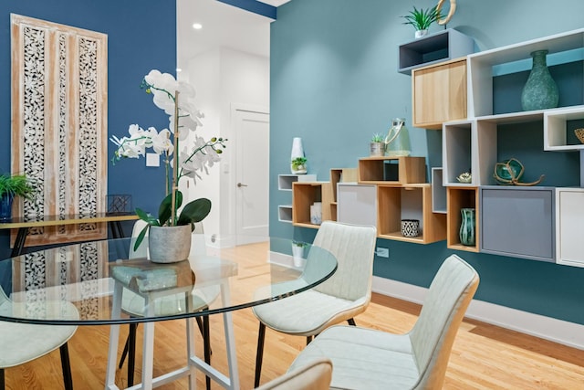 2113 N Clark St, Chicago, IL 60614 - dining area with wood finished floors and baseboards