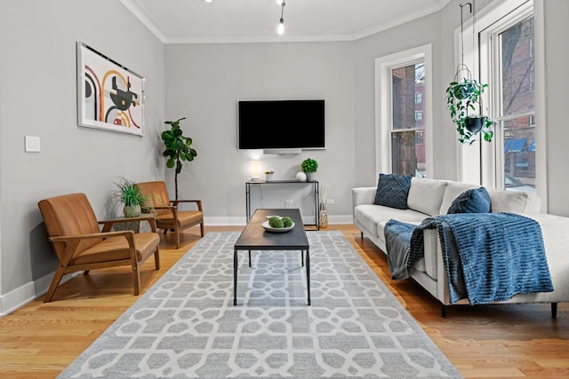2113 N Clark St, Chicago, IL 60614 - living room with ornamental molding, wood finished floors, and baseboards