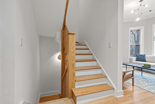 2113 N Clark St, Chicago, IL 60614 - stairway featuring wood finished floors and baseboards