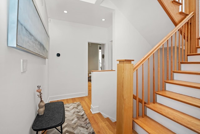 2113 N Clark St, Chicago, IL 60614 - stairs with wood finished floors, recessed lighting, and baseboards