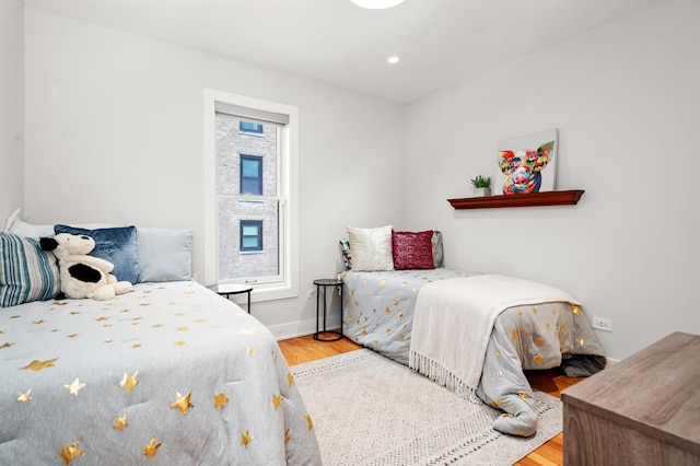 2113 N Clark St, Chicago, IL 60614 - bedroom with wood finished floors, baseboards, and recessed lighting