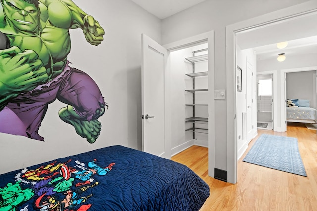 2113 N Clark St, Chicago, IL 60614 - bedroom featuring wood finished floors and baseboards