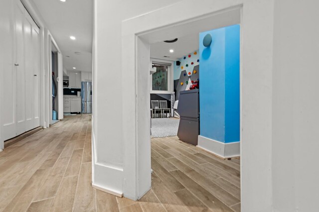 2113 N Clark St, Chicago, IL 60614 - hallway featuring light wood-type flooring, recessed lighting, and baseboards