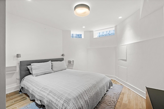 2113 N Clark St, Chicago, IL 60614 - bedroom with light wood-type flooring, recessed lighting, and baseboards