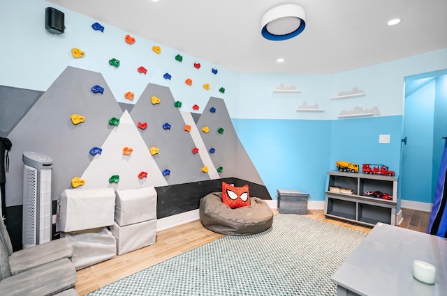 2113 N Clark St, Chicago, IL 60614 - recreation room featuring wood finished floors, baseboards, and recessed lighting