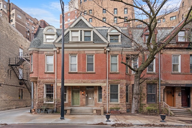 2113 N Clark St, Chicago, IL 60614 - townhome / multi-family property featuring brick siding and roof with shingles