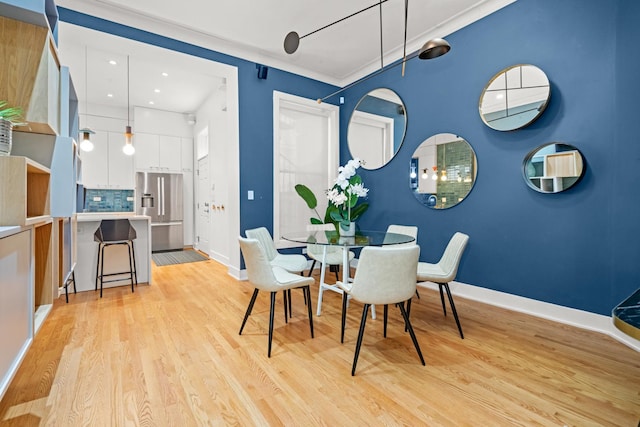2113 N Clark St, Chicago, IL 60614 - dining room with light wood-type flooring, baseboards, and recessed lighting