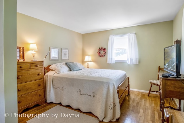 527 Edwin Dr, Bourbonnais, IL 60914 - bedroom featuring wood finished floors and baseboards