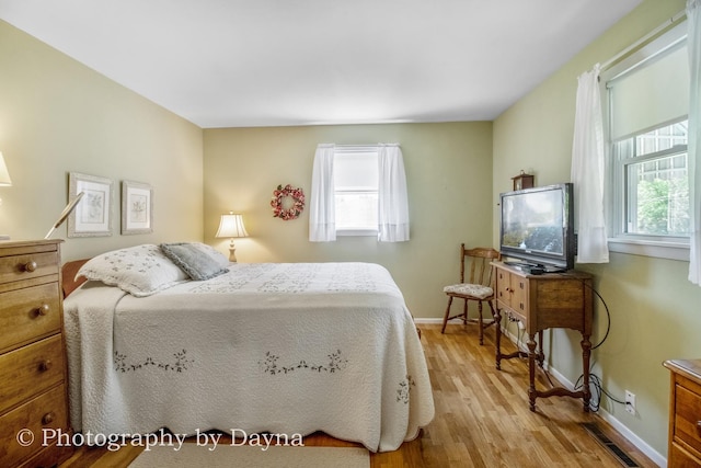 527 Edwin Dr, Bourbonnais, IL 60914 - bedroom with wood finished floors and baseboards