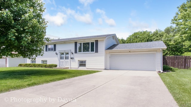 527 Edwin Dr, Bourbonnais, IL 60914 - bi-level home featuring an attached garage and concrete driveway