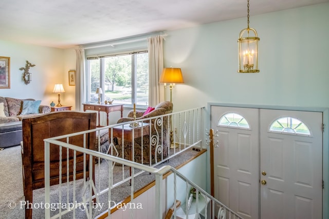 527 Edwin Dr, Bourbonnais, IL 60914 - foyer entrance featuring healthy amount of natural light and a chandelier