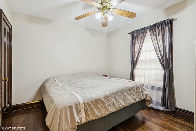 7229 W Lunt Ave, Chicago, IL 60631 - bedroom with wood finished floors and ceiling fan