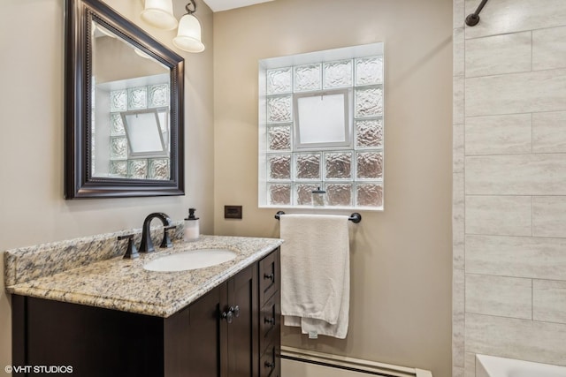 7229 W Lunt Ave, Chicago, IL 60631 - bathroom with vanity, a baseboard heating unit, plenty of natural light, and  shower combination