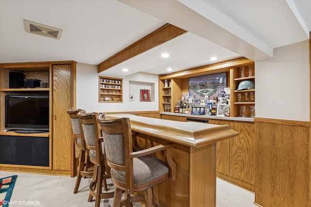 7229 W Lunt Ave, Chicago, IL 60631 - indoor bar featuring recessed lighting, light tile patterned floors, and built in features