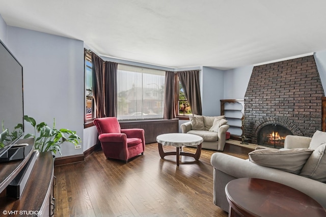 7229 W Lunt Ave, Chicago, IL 60631 - living room featuring a fireplace and hardwood / wood-style floors