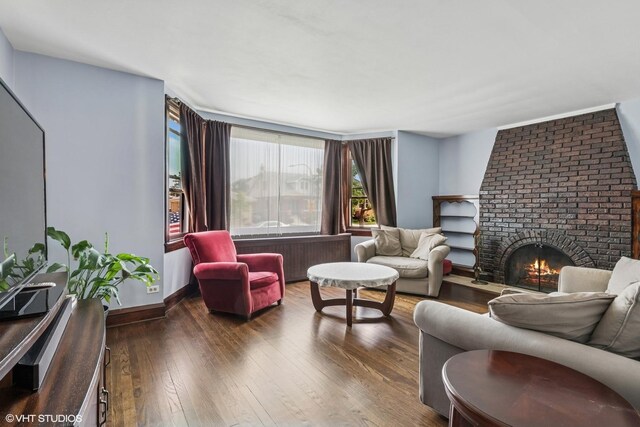 7229 W Lunt Ave, Chicago, IL 60631 - living room featuring a fireplace and hardwood / wood-style floors