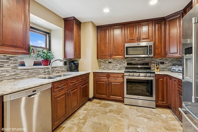 7229 W Lunt Ave, Chicago, IL 60631 - kitchen featuring appliances with stainless steel finishes, stone finish floors, backsplash, light stone countertops, and recessed lighting