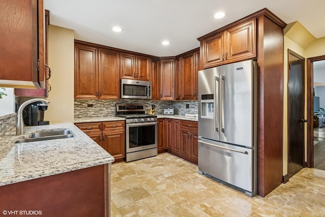 7229 W Lunt Ave, Chicago, IL 60631 - kitchen featuring stainless steel appliances, light stone counters, tasteful backsplash, recessed lighting, and light stone finish floors