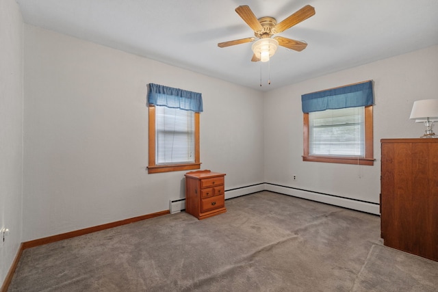 1811 Dearborn St, Crest Hill, IL 60403 - carpeted spare room featuring healthy amount of natural light, a baseboard radiator, a ceiling fan, and a baseboard heating unit