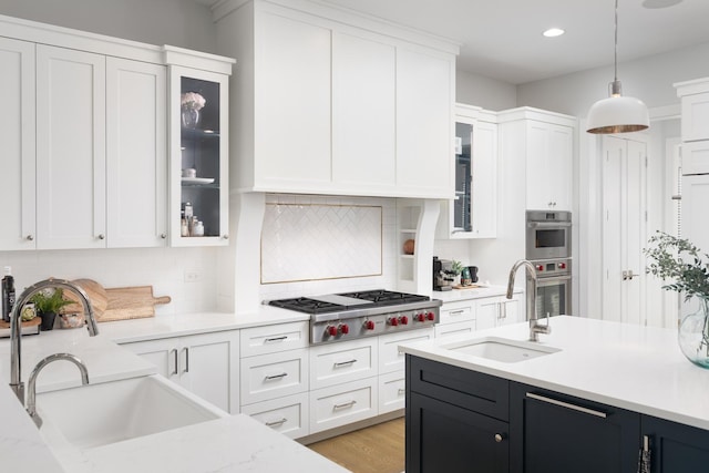 834 Wellner Rd, Naperville, IL 60540 - kitchen featuring stainless steel appliances, white cabinets, pendant lighting, backsplash, and recessed lighting