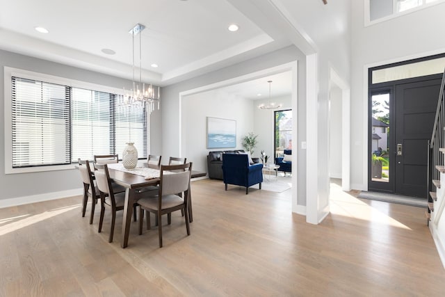 834 Wellner Rd, Naperville, IL 60540 - dining area featuring a chandelier, light wood finished floors, recessed lighting, and a tray ceiling
