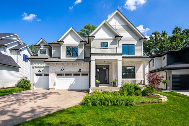 834 Wellner Rd, Naperville, IL 60540 - view of front of property with driveway, an attached garage, a porch, a front yard, and a balcony