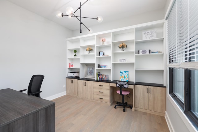 834 Wellner Rd, Naperville, IL 60540 - office area featuring light wood-style flooring and a chandelier