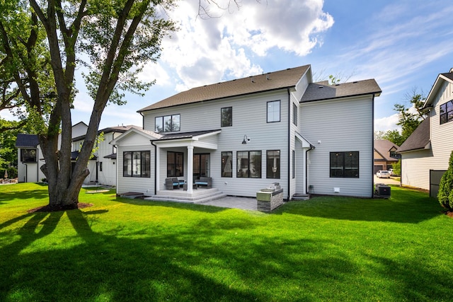 834 Wellner Rd, Naperville, IL 60540 - back of house featuring a yard and a patio area