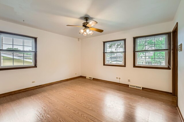 907 E Crabtree Dr, Arlington Heights, IL 60004 - unfurnished room with wood finished floors and ceiling fan