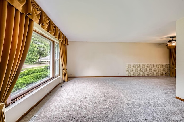907 E Crabtree Dr, Arlington Heights, IL 60004 - carpeted spare room featuring baseboards and a ceiling fan
