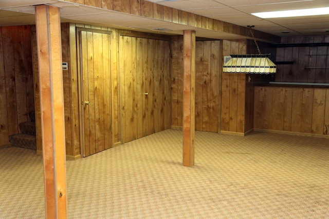 402 Catbird Ln, Deerfield, IL 60015 - finished basement with carpet, wood walls, and a paneled ceiling