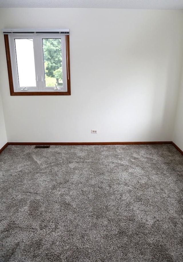 402 Catbird Ln, Deerfield, IL 60015 - unfurnished room featuring carpet floors and baseboards