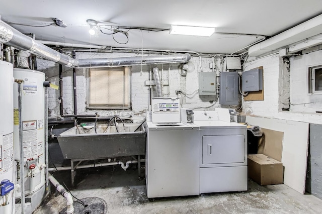 3425 W Lyndale St, Chicago, IL 60647 - unfinished below grade area featuring separate washer and dryer, electric panel, water heater, and a sink