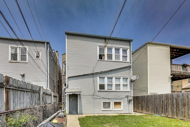 3425 W Lyndale St, Chicago, IL 60647 - rear view of property with a fenced backyard