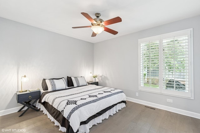 31 E Sandpiper Ln, Lake Forest, IL 60045 - bedroom featuring wood finished floors, multiple windows, and a ceiling fan