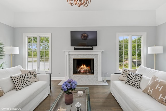 31 E Sandpiper Ln, Lake Forest, IL 60045 - living area with plenty of natural light, a fireplace, and dark wood-type flooring
