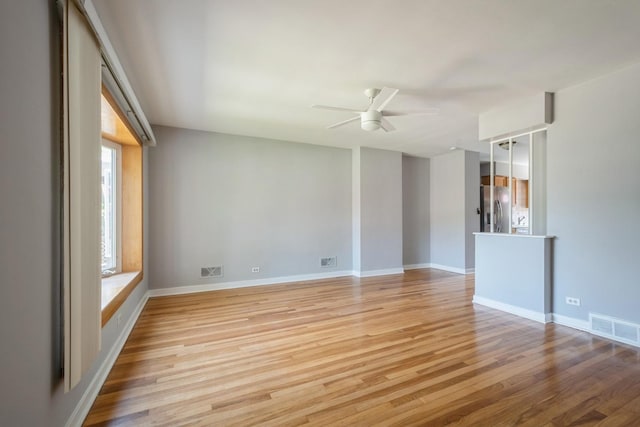 1718 Hovland Ct, Evanston, IL 60201 - unfurnished room featuring ceiling fan and light wood-style floors